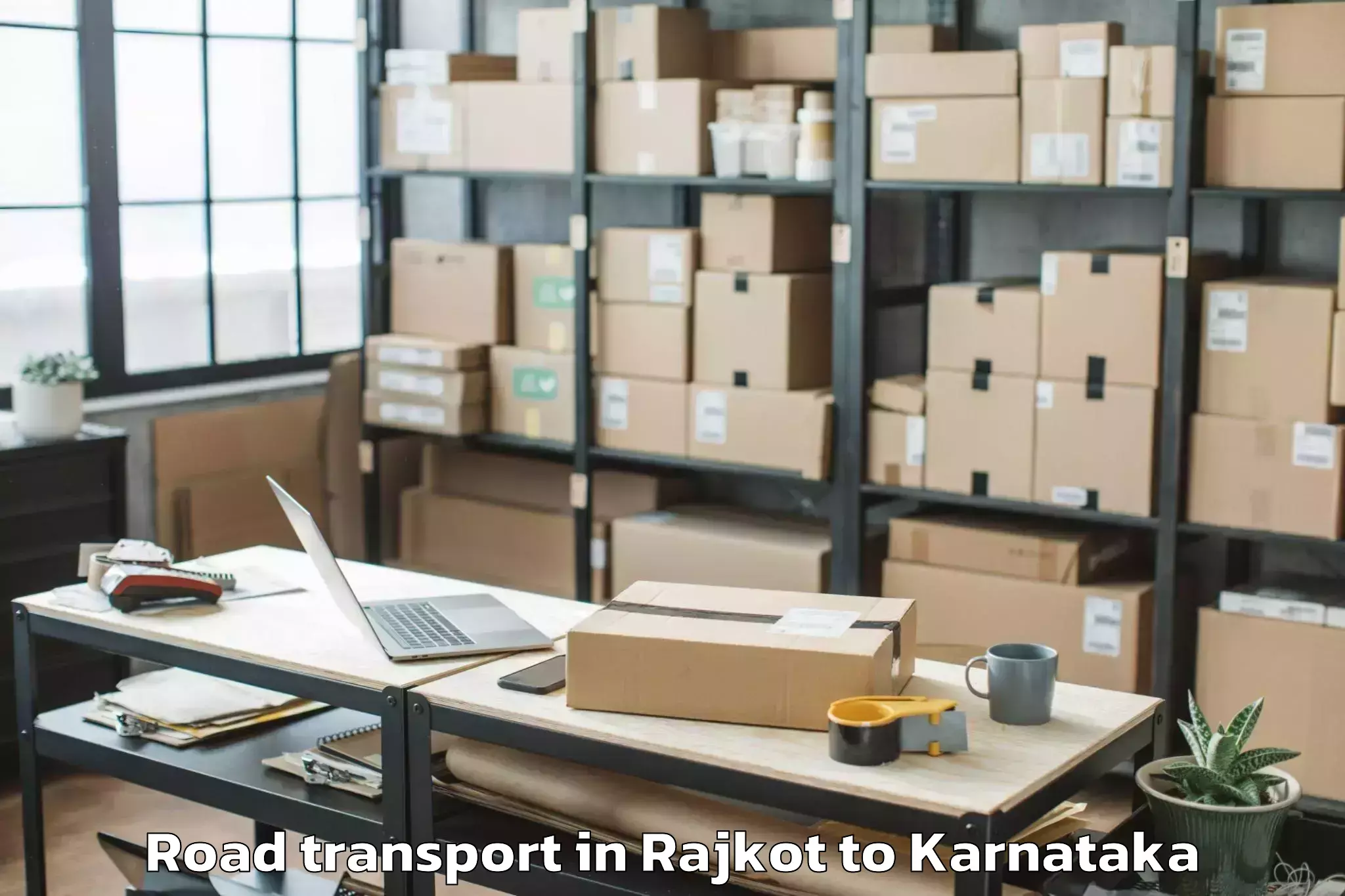 Book Rajkot to Visvesvaraya Technological Uni Road Transport Online